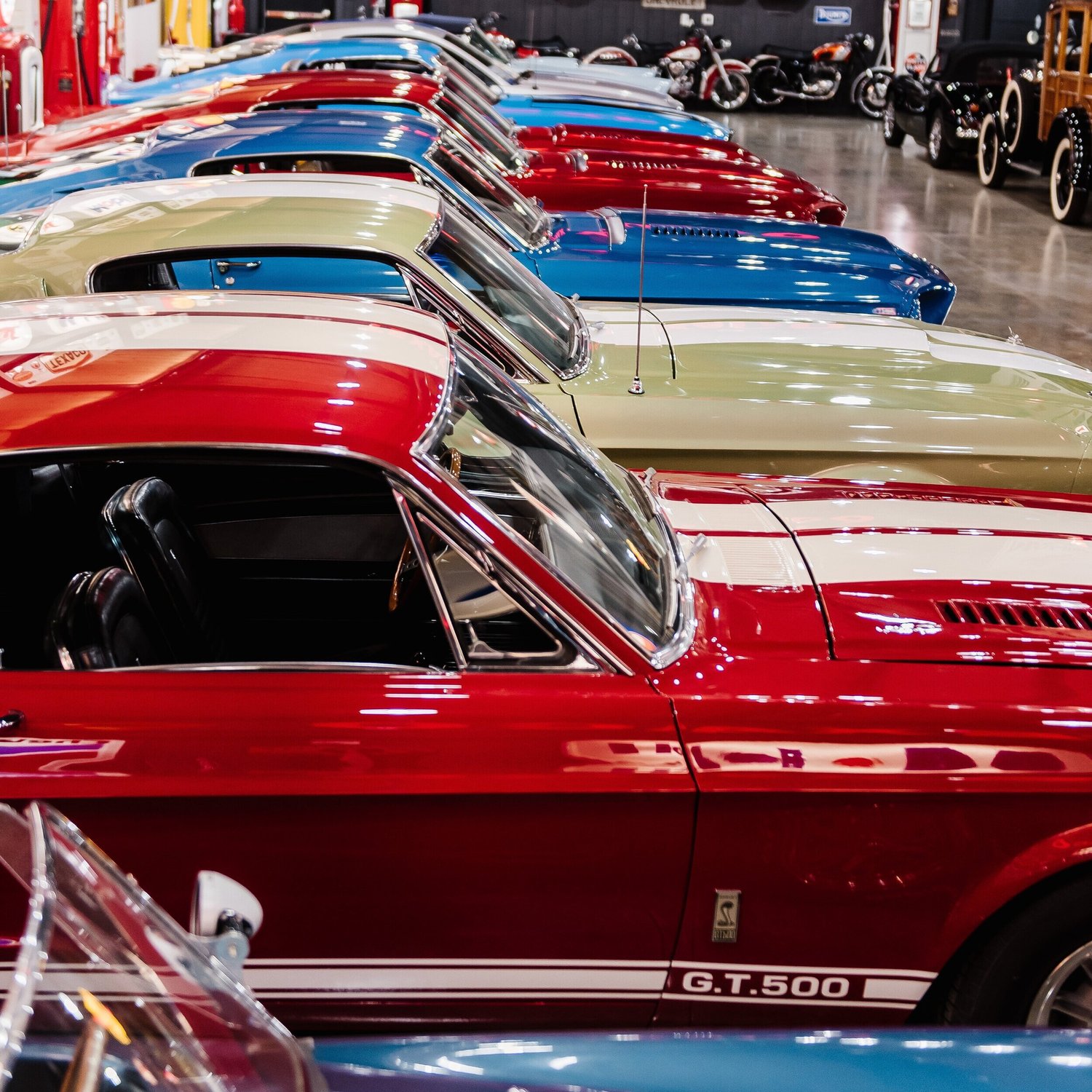 A row of classic Ford Mustangs